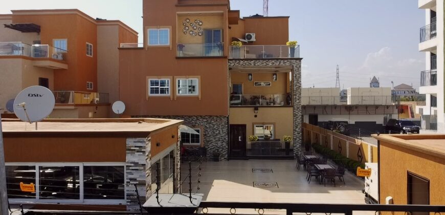 Eight (8) bedroom house  for sale at East Legon kfc  fully furnished