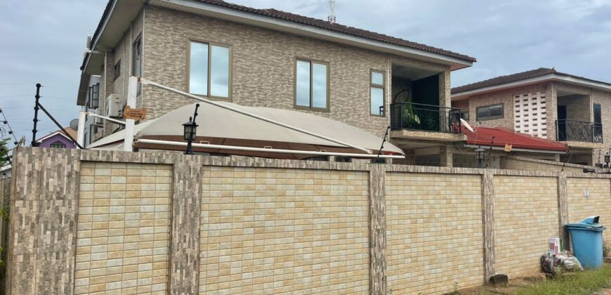 4 bedroom semi-detached house with garage and BQ selling at east legon