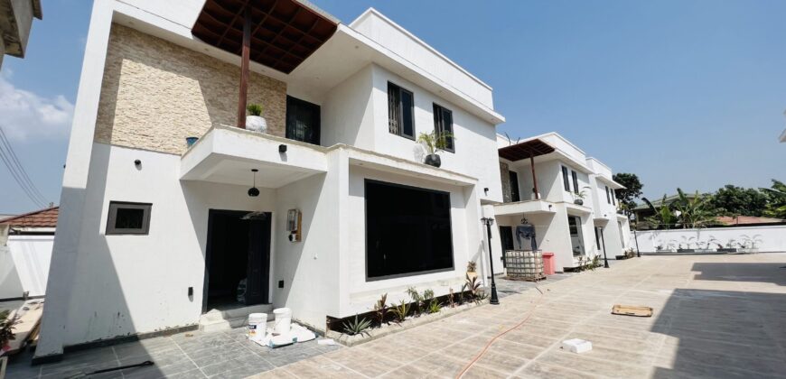 Executive 4 bedroom townhouse in a gated community of 5 with swimming pool at spintex for sale