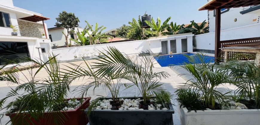 Executive 4 bedroom townhouse in a gated community of 5 with swimming pool at spintex for sale