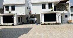 Executive 4 bedroom townhouse in a gated community of 5 with swimming pool at spintex for sale