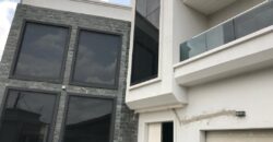 Executive 6 bedroom house with luxurious swimming pool with one boys quarters located at East legon-Ogbojo for sale