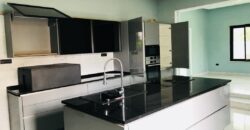 Executive 6 bedroom house with luxurious swimming pool with one boys quarters located at East legon-Ogbojo for sale