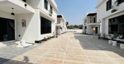 Executive 4 bedroom townhouse in a gated community of 5 with swimming pool at spintex for sale