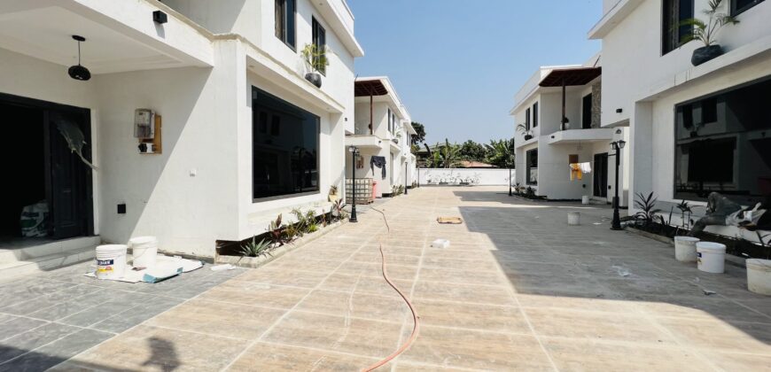 Executive 4 bedroom townhouse in a gated community of 5 with swimming pool at spintex for sale