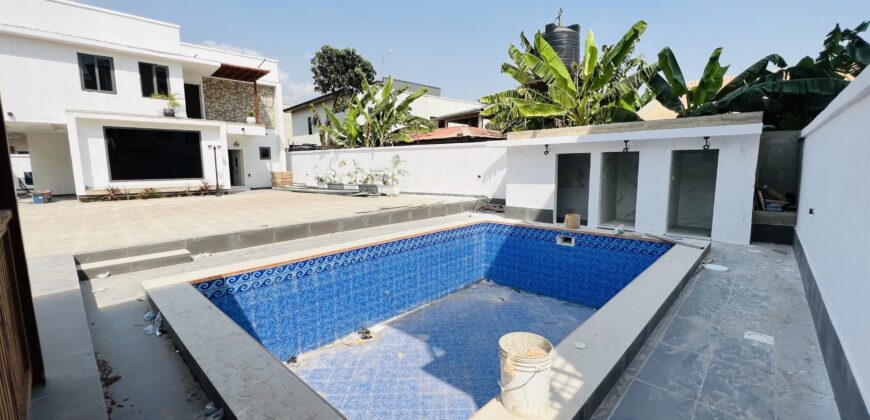 Executive 4 bedroom townhouse in a gated community of 5 with swimming pool at spintex for sale