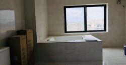 Executive 6 bedroom house with luxurious swimming pool with one boys quarters located at East legon-Ogbojo for sale