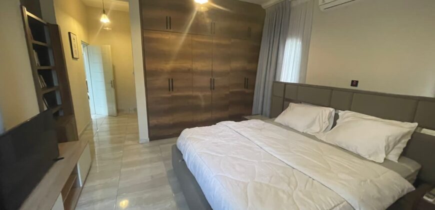 4 bedroom house with BQ, security post swimming pool on a 3 plots of land  now selling at Aburi peduase