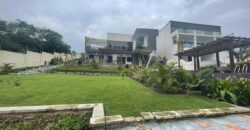 4 bedroom house with BQ, security post swimming pool on a 3 plots of land  now selling at Aburi peduase