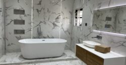 4bedroom with a boysquarters and a swimming pool for sale at school junction Botwe