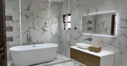 4bedroom with a boysquarters and a swimming pool for sale at school junction Botwe