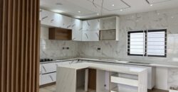 4bedroom with a boysquarters and a swimming pool for sale at school junction Botwe