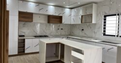 4bedroom with a boysquarters and a swimming pool for sale at school junction Botwe