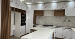 4bedroom with a boysquarters and a swimming pool for sale at school junction Botwe