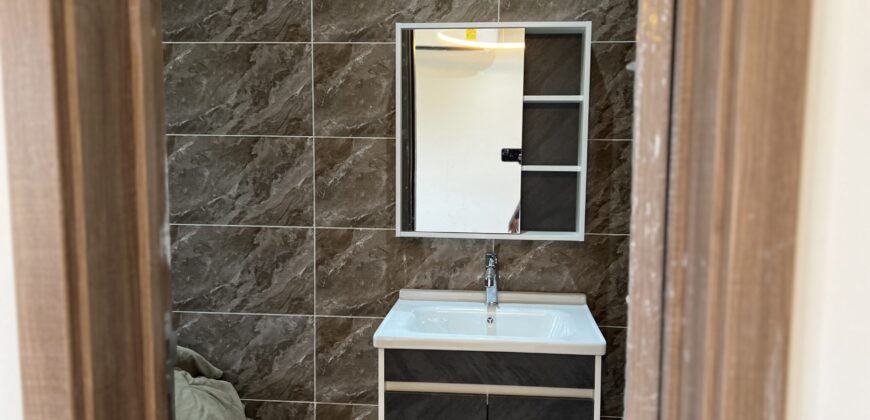 4bedroom with a boysquarters and a swimming pool for sale at school junction Botwe