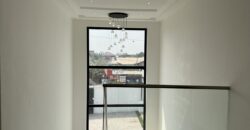 4bedroom with a boysquarters and a swimming pool for sale at school junction Botwe