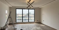 4bedroom with a boysquarters and a swimming pool for sale at school junction Botwe