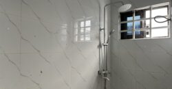 4bedroom with a boysquarters and a swimming pool for sale at school junction Botwe