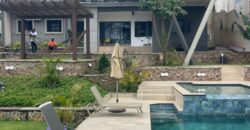 4 bedroom house with BQ, security post swimming pool on a 3 plots of land  now selling at Aburi peduase