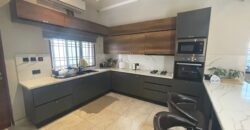 4 bedroom house with BQ, security post swimming pool on a 3 plots of land  now selling at Aburi peduase