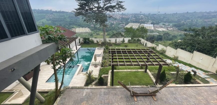 4 bedroom house with BQ, security post swimming pool on a 3 plots of land  now selling at Aburi peduase