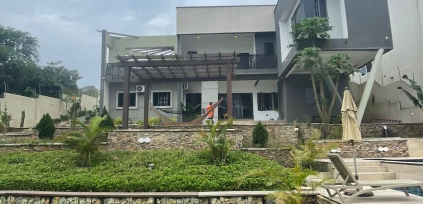 4 bedroom house with BQ, security post swimming pool on a 3 plots of land  now selling at Aburi peduase
