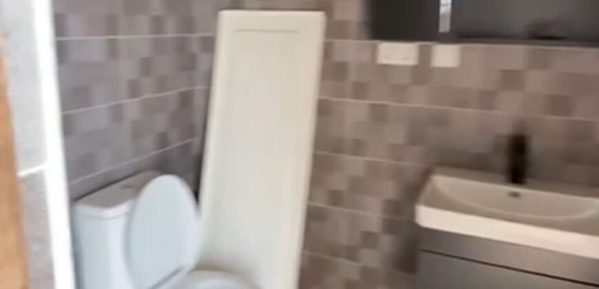 Alert ultra modern 4 bedroom house with BQ , security post situated on 1.5 plots of land underground basement now selling at Aburi