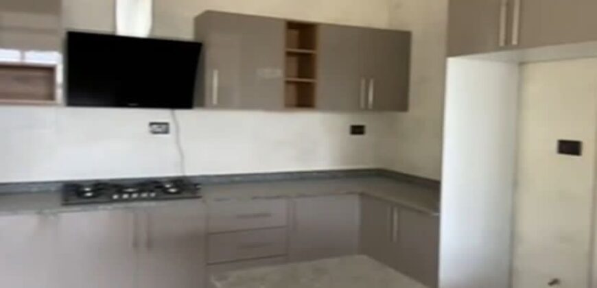 Alert ultra modern 4 bedroom house with BQ , security post situated on 1.5 plots of land underground basement now selling at Aburi