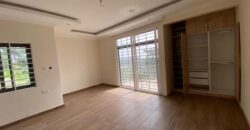 Alert ultra modern 4 bedroom house with BQ , security post situated on 1.5 plots of land underground basement now selling at Aburi