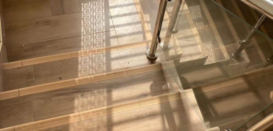 Alert ultra modern 4 bedroom house with BQ , security post situated on 1.5 plots of land underground basement now selling at Aburi