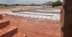 1.231 Acre landed property || uncompleted shop || block factory for sale at Oyibi