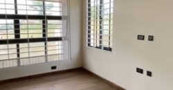 Alert ultra modern 4 bedroom house with BQ , security post situated on 1.5 plots of land underground basement now selling at Aburi