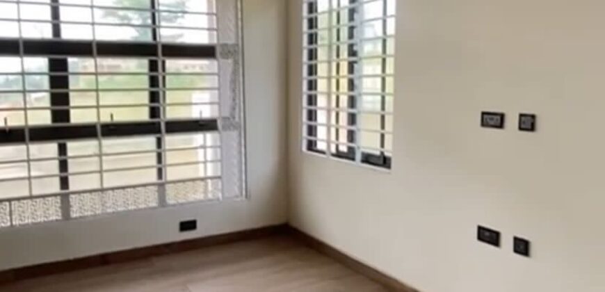 Alert ultra modern 4 bedroom house with BQ , security post situated on 1.5 plots of land underground basement now selling at Aburi