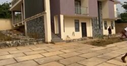 Alert ultra modern 4 bedroom house with BQ , security post situated on 1.5 plots of land underground basement now selling at Aburi