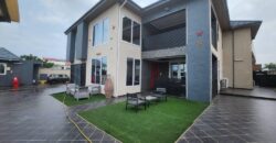 modern mansion within a gated community at Airport Hills