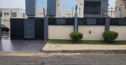 modern mansion within a gated community at Airport Hills