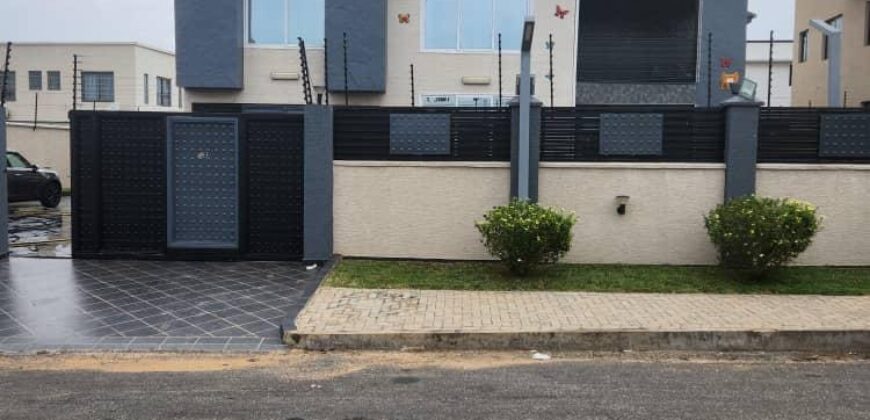 modern mansion within a gated community at Airport Hills