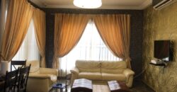 modern mansion within a gated community at Airport Hills