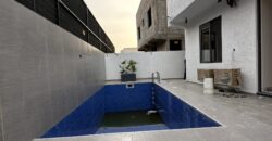 For Sale: Stunning 4-Bedroom Home with Swimming Pool