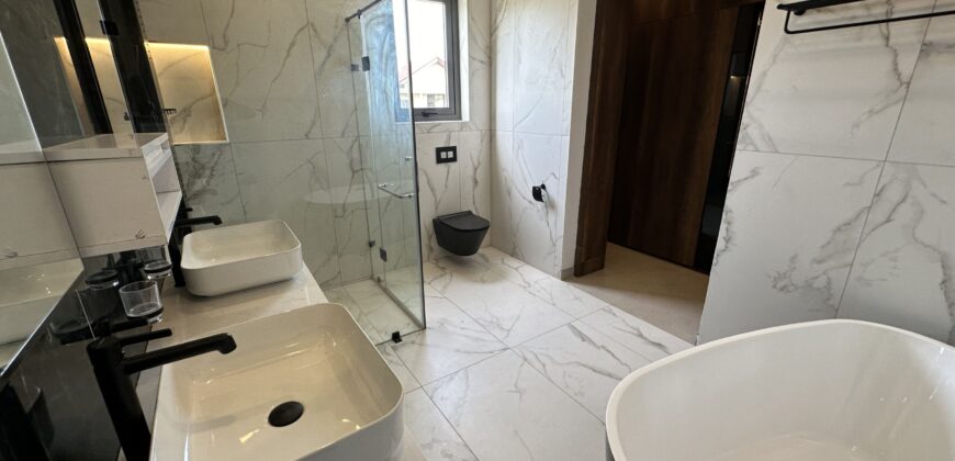 Luxurious 4-Bedroom Home with Maids Quarters for Sale – Community 16, Accra