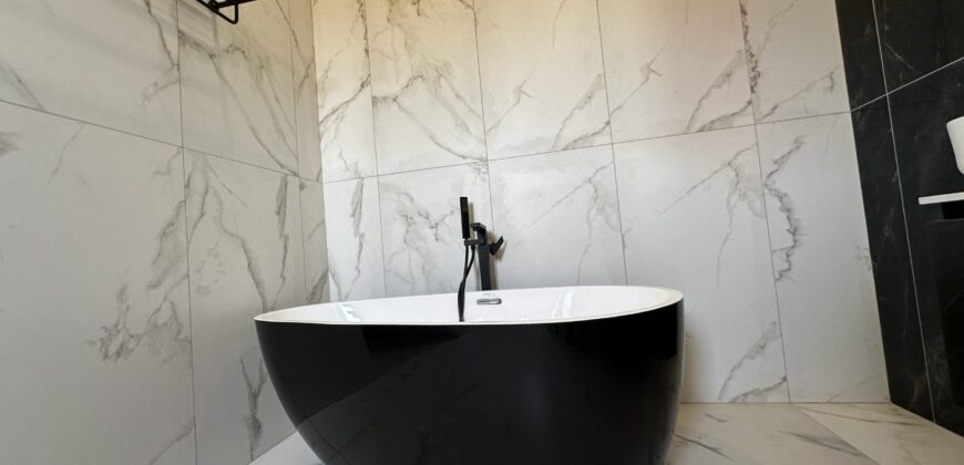 Luxurious 4-Bedroom Home with Maids Quarters for Sale – Community 16, Accra