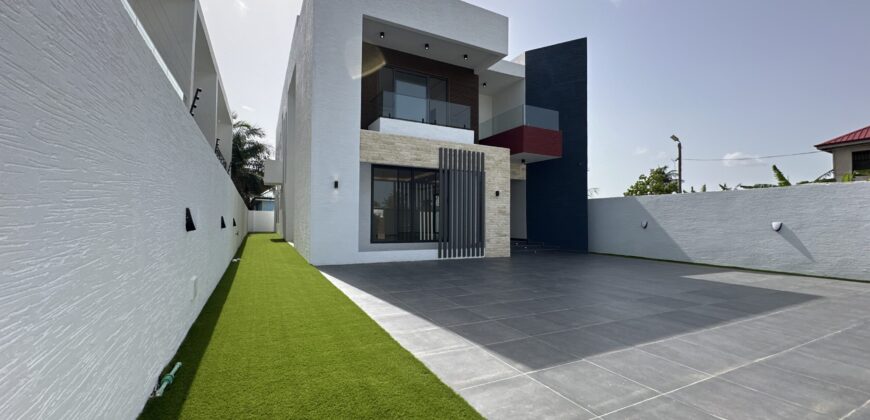Luxurious 4-Bedroom Home with Maids Quarters for Sale – Community 16, Accra
